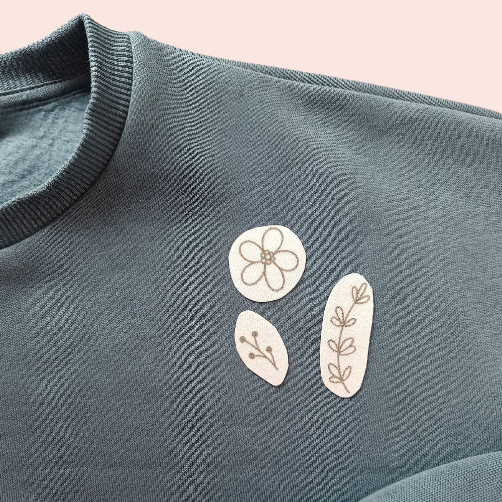 Borduren op kleding met oplosbare borduurpatronen